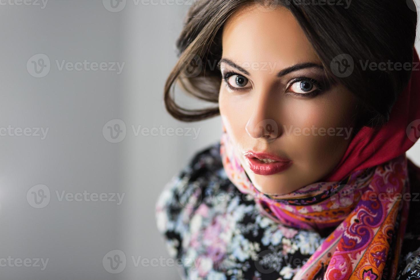Portrait of young excited brunette photo