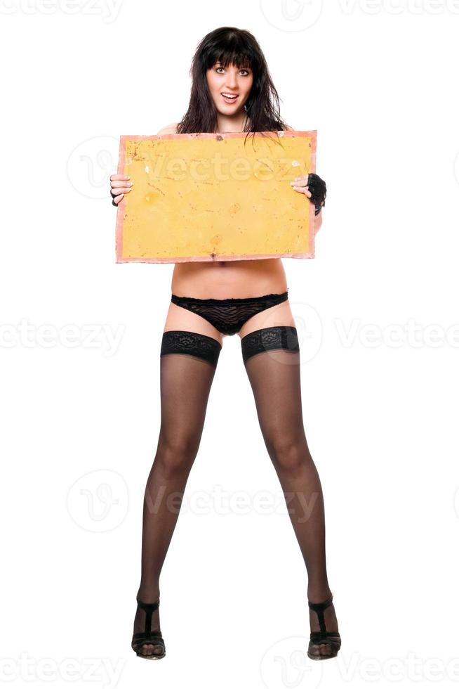 young brunette taking vintage yellow board photo