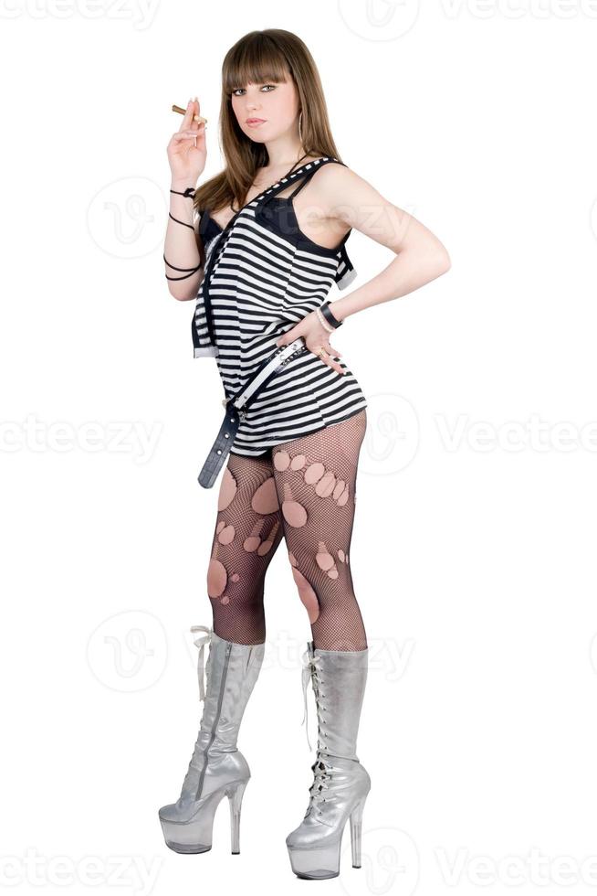 Girl in a striped dress and silvery boots photo