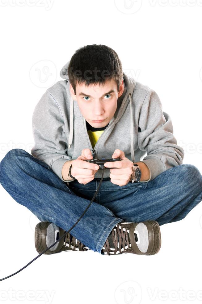 Young man with a joystick photo