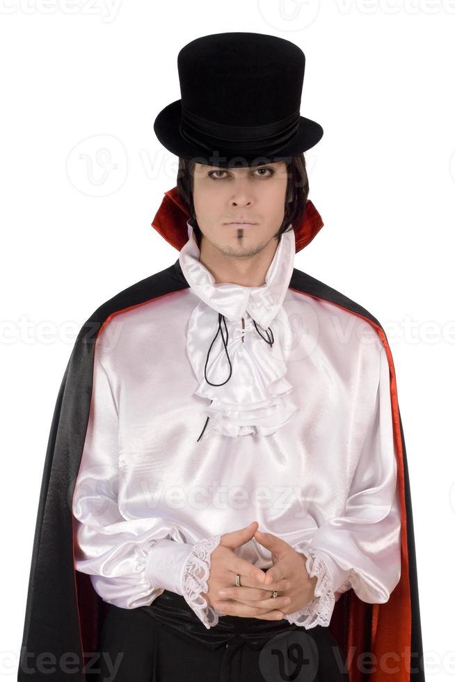 Young man in a suit of Count Dracula photo