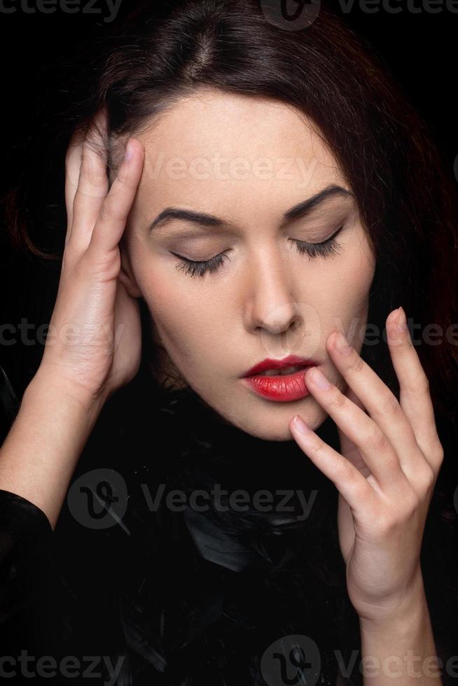 young lady with closed eyes photo