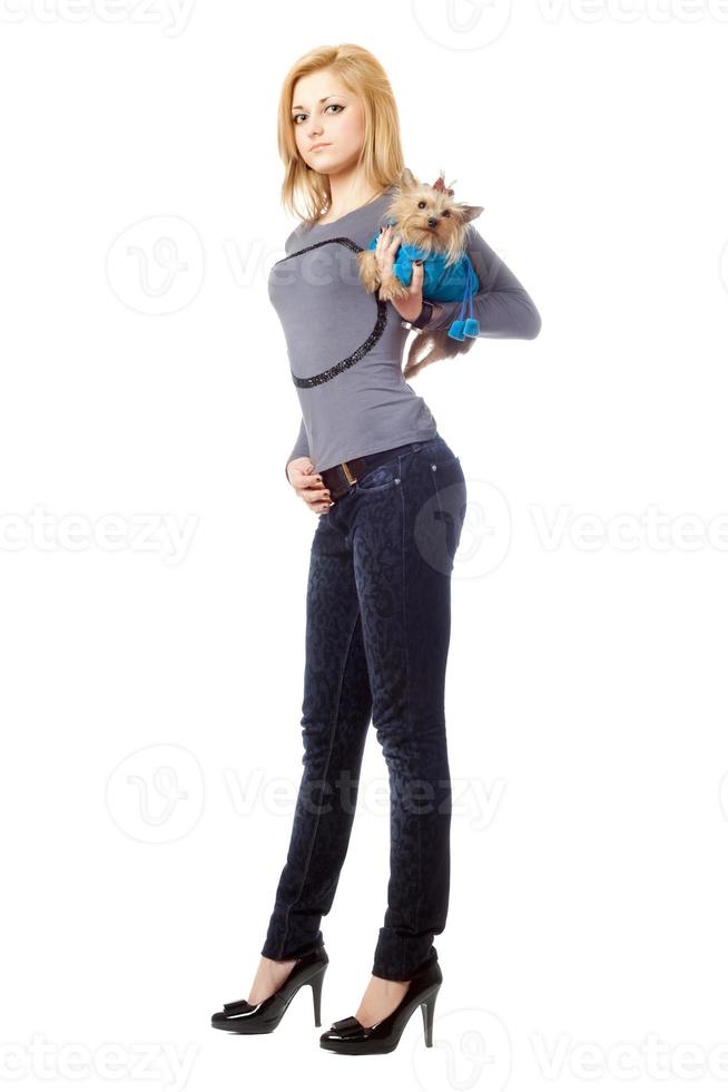 Attractive blonde posing with puppy. Isolated photo