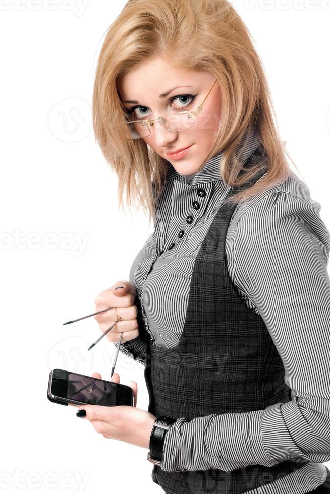 Portrait of young blonde with smartphone photo