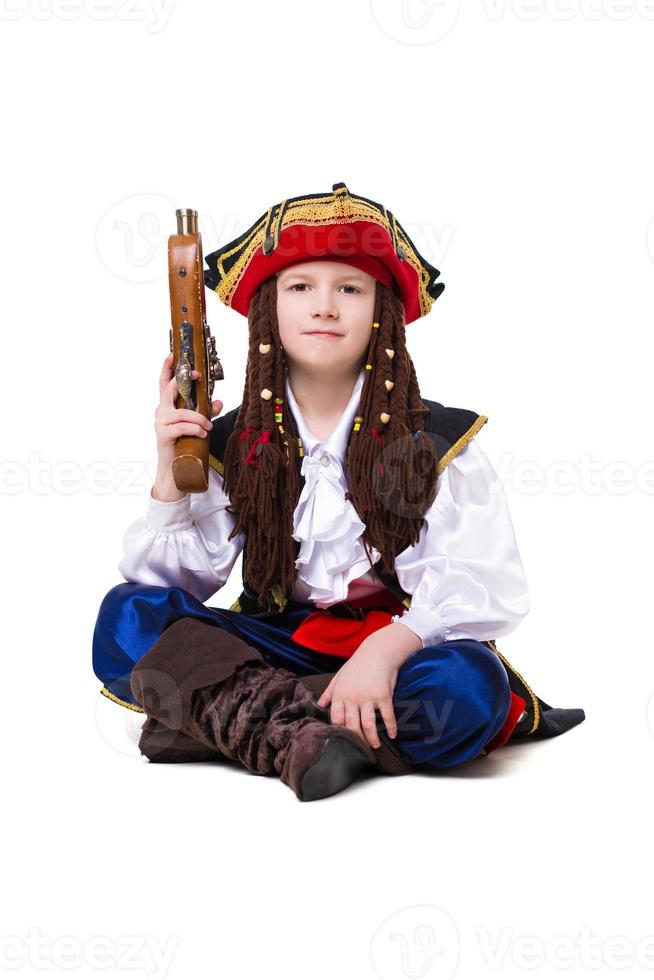 Young boy dressed as pirate photo