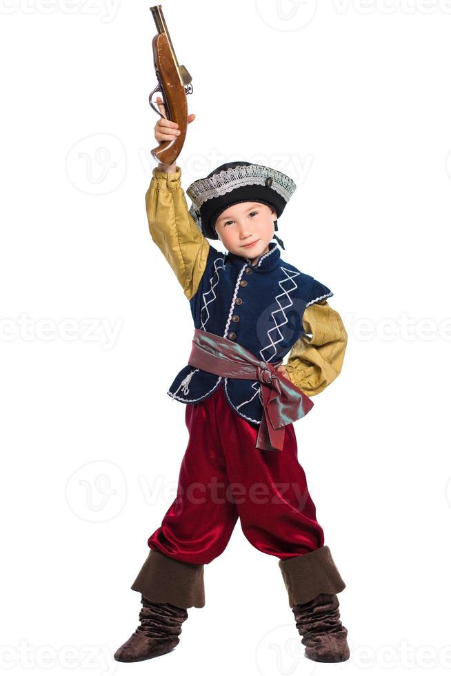 Young boy dressed as pirate photo