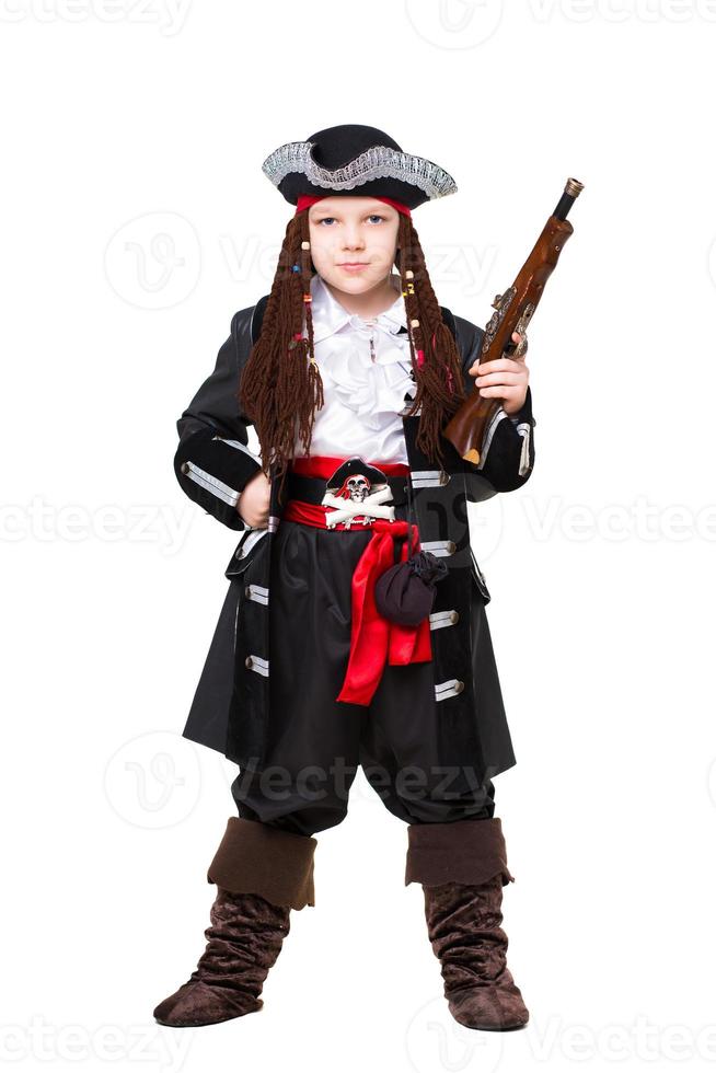 Young boy posing in pirate costume photo