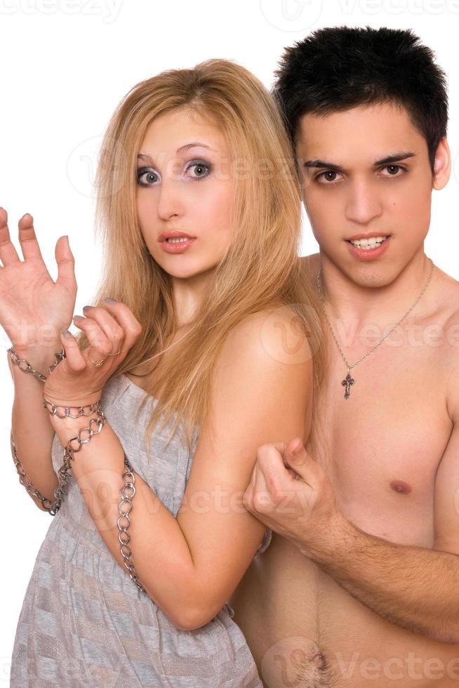 Young man and a blonde in chains photo