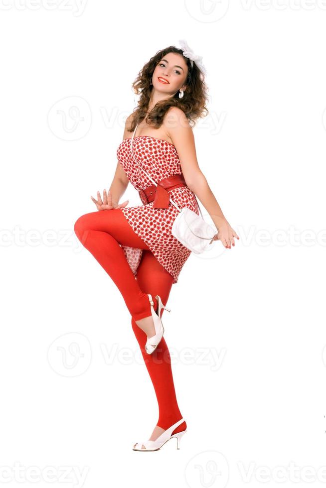 Playful young woman in dress photo