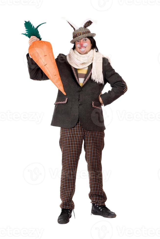 Young man with carrot photo