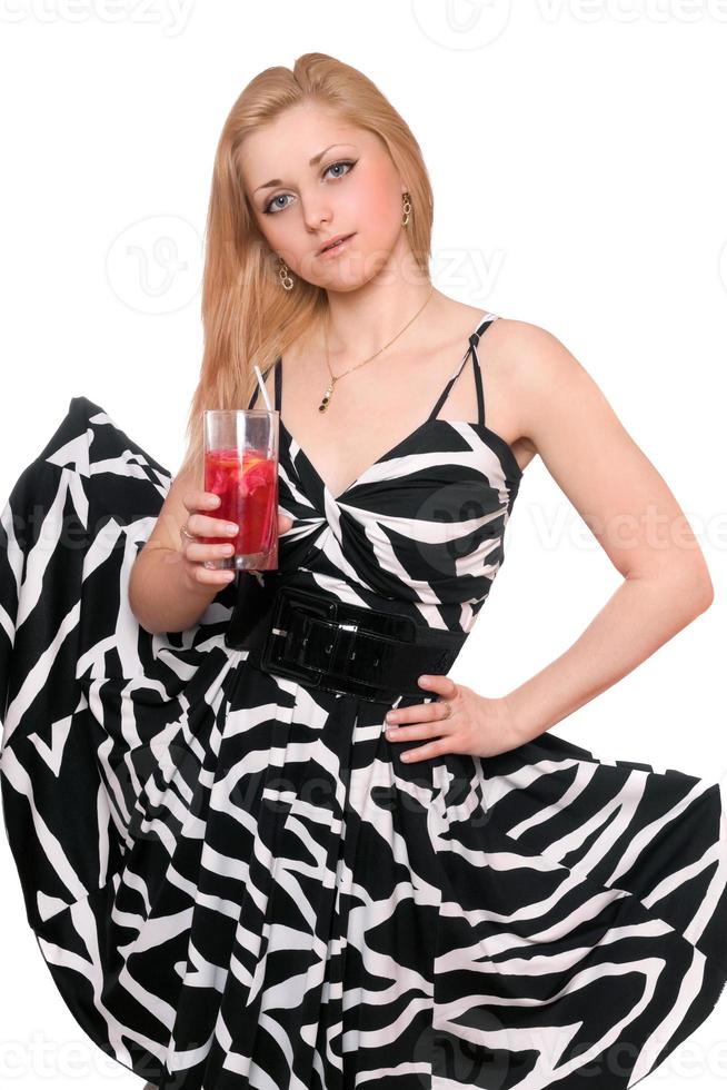 Beautiful young woman with a cocktail photo