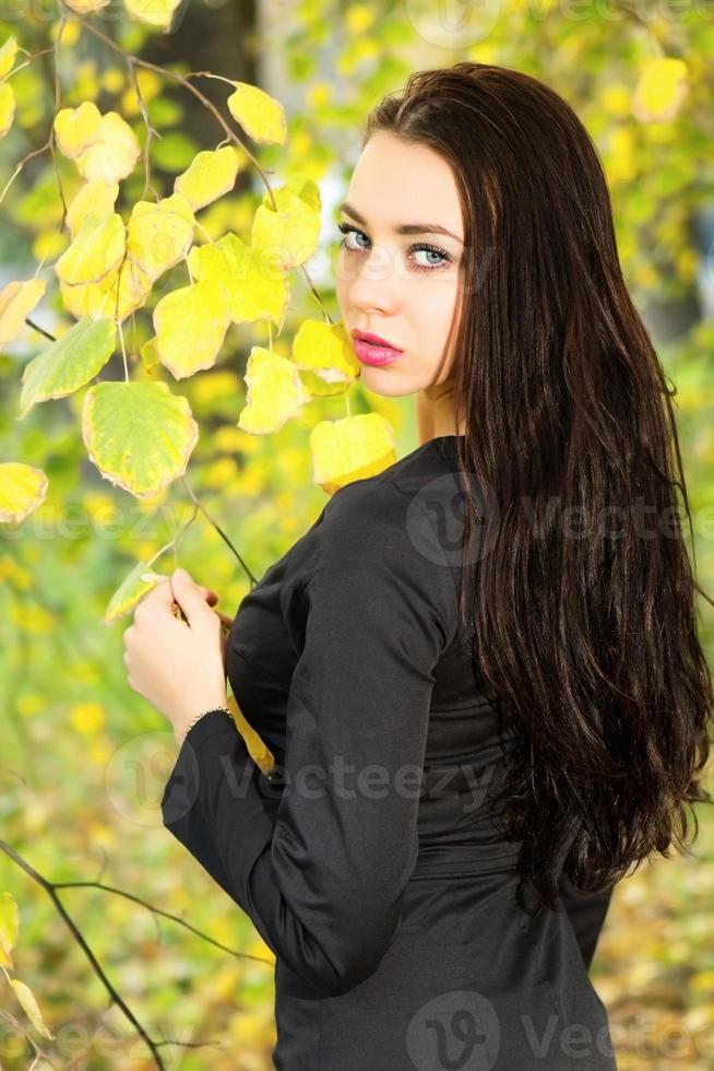 Pretty brunette in black photo