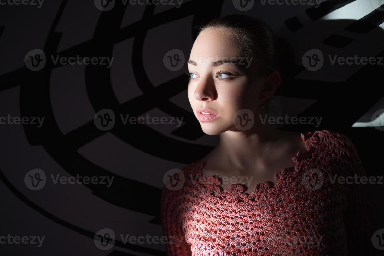 Portrait of thoughtful young lady photo