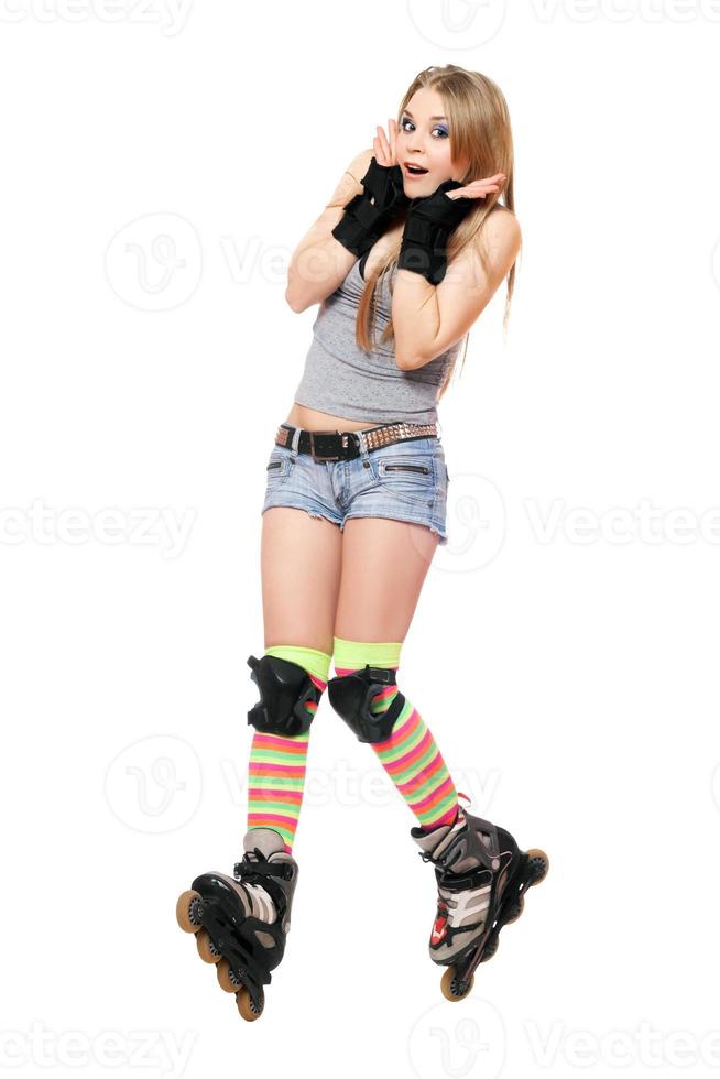Scared girl with roller skates photo