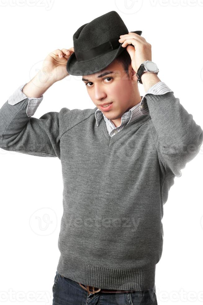 Young smiling handsome man wearing black hat photo