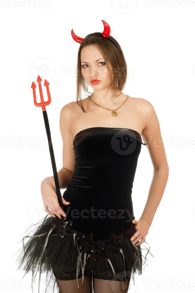 Attractive girl is wearing a devil costume photo