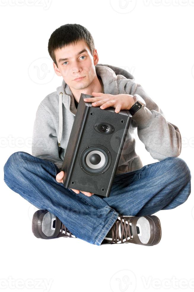 Young man with a speaker photo