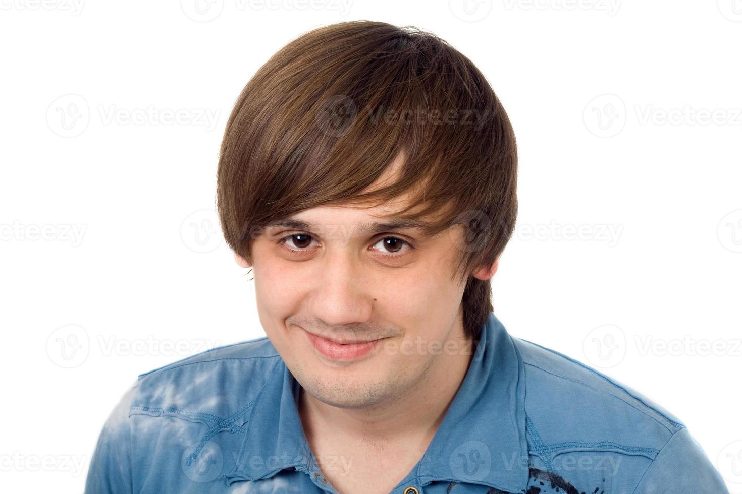 Portrait of  the smiling young man. Isolated. photo