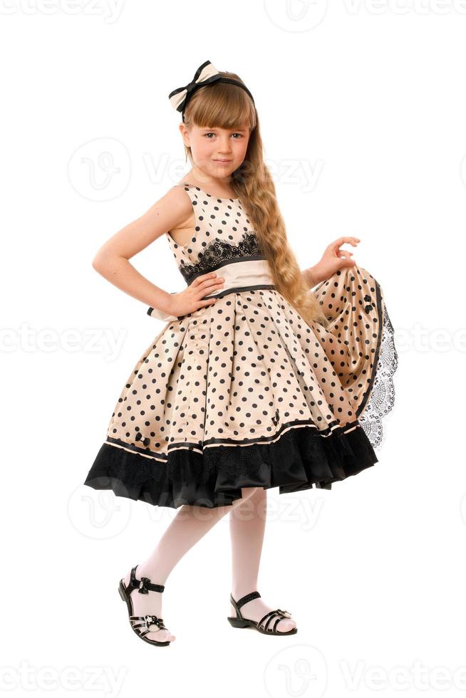 Lovely little girl in a dress photo