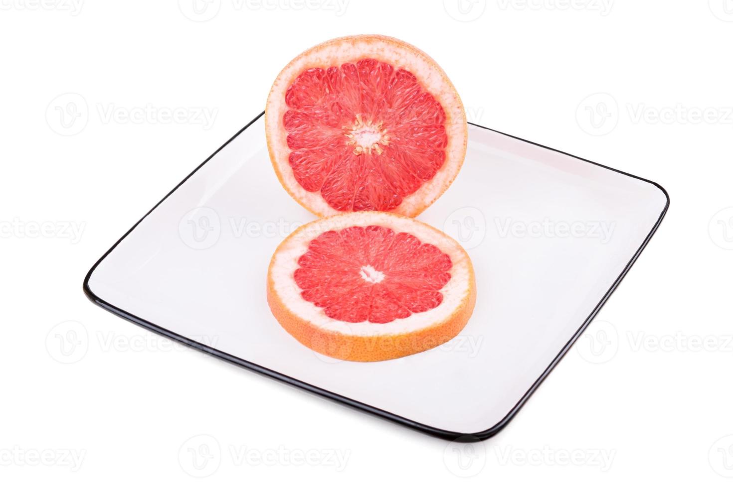 Grapefruit in square plate photo