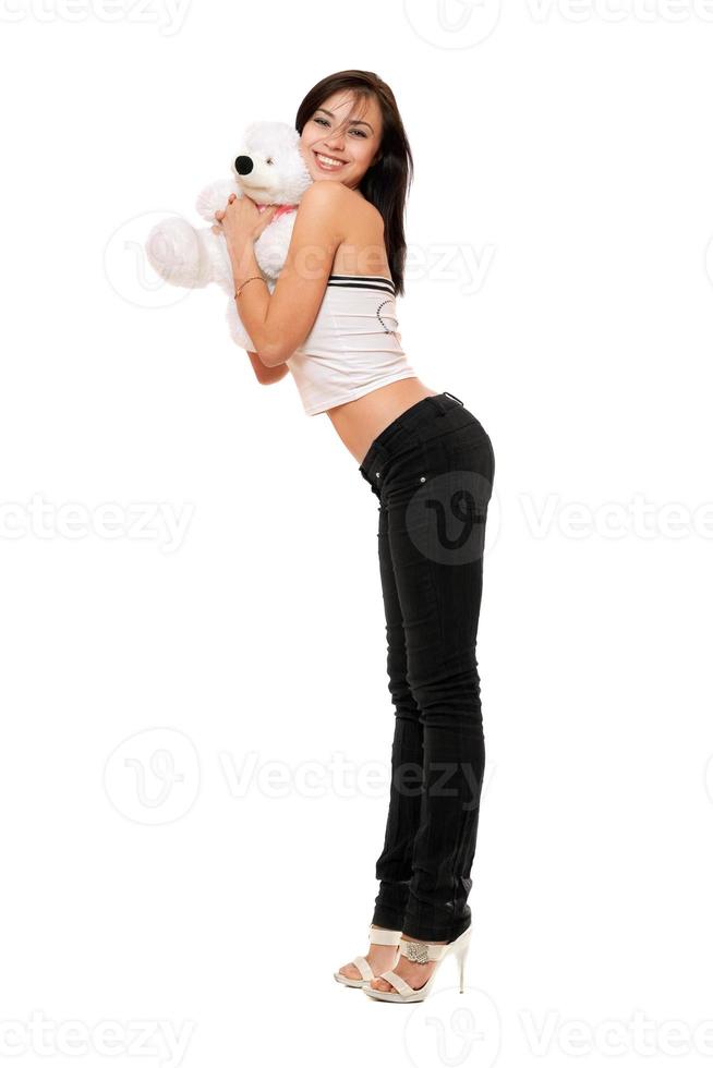 Cheerful beautiful girl with a teddybear photo