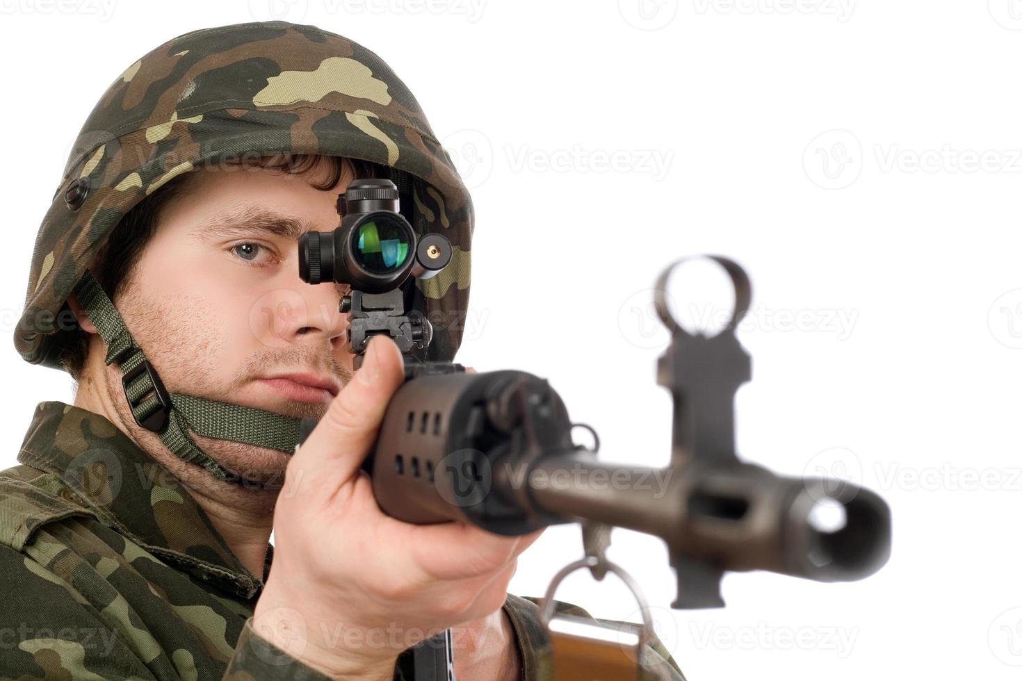 Armed soldier keeping svd photo