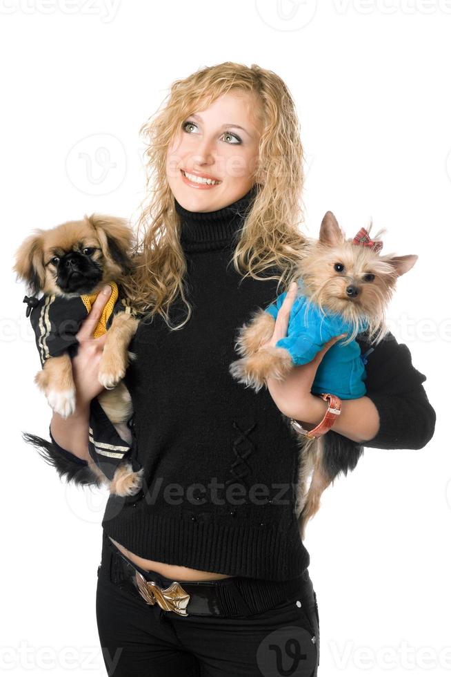 Portrait of happy young blonde with two dogs photo