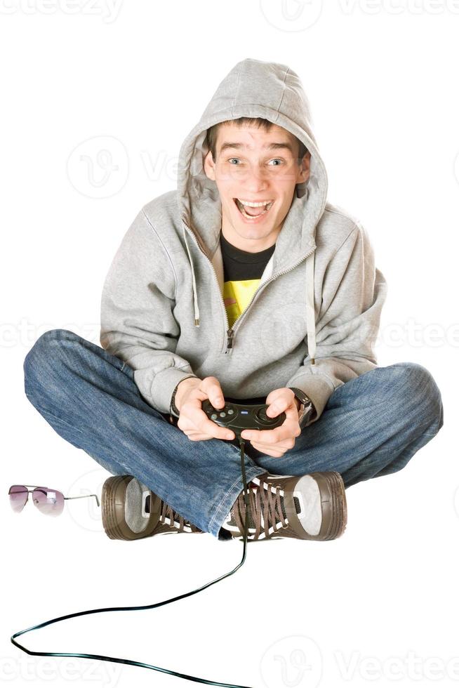 Joyful guy with a joystick photo