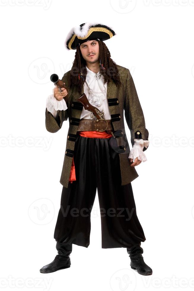 Young man in a pirate costume with pistol photo