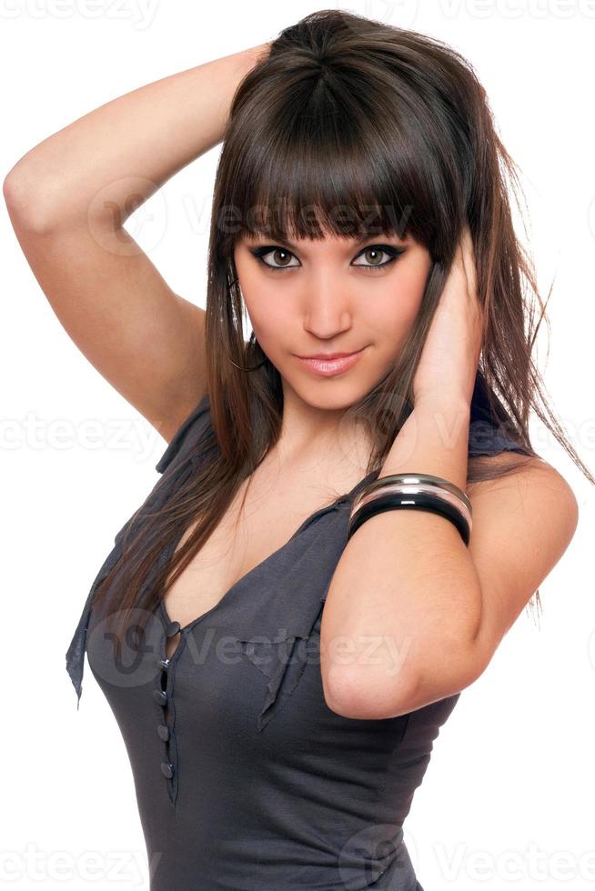 Portrait of pretty brunette in a dress photo