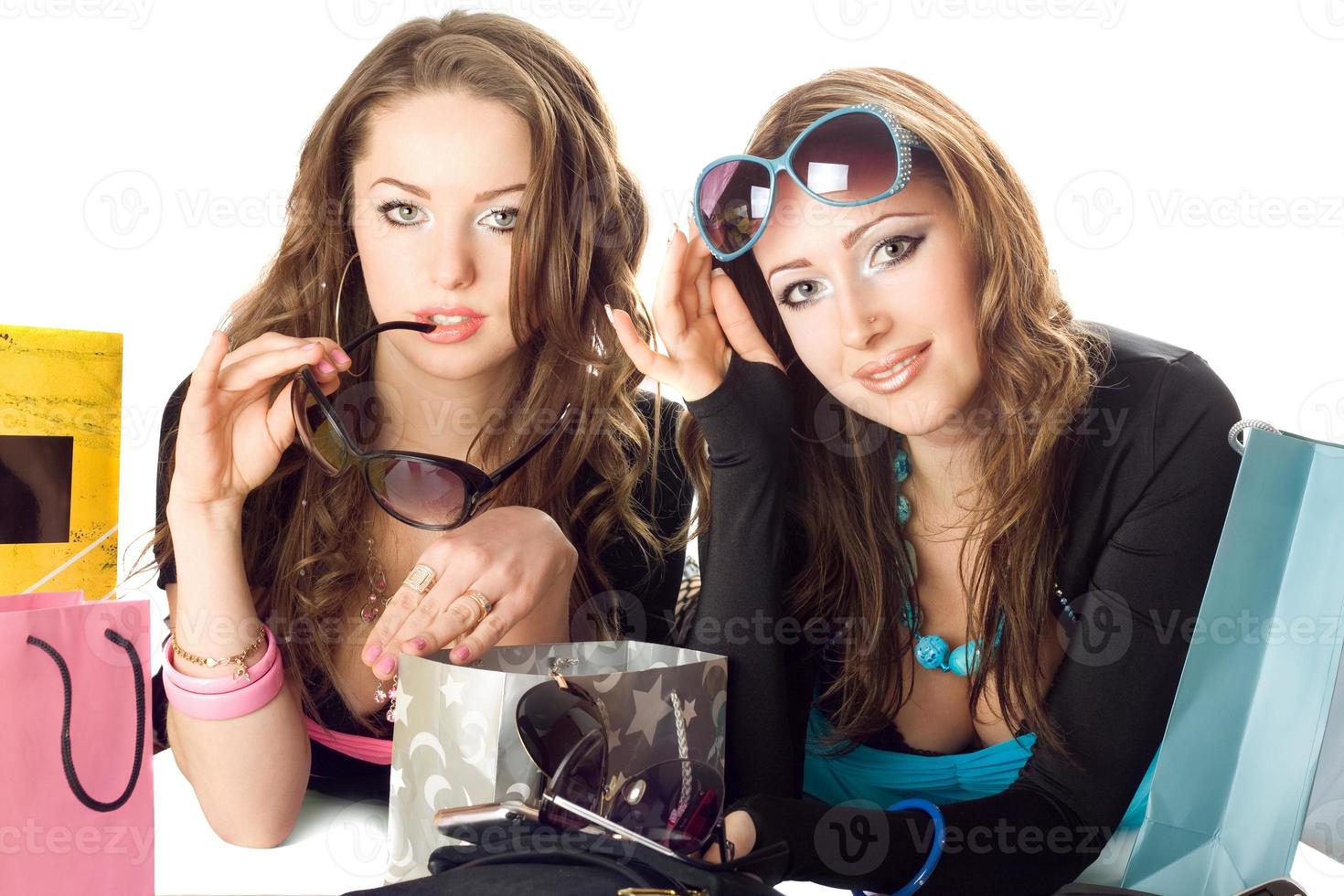 Two beautiful girlfriends in sunglasses photo