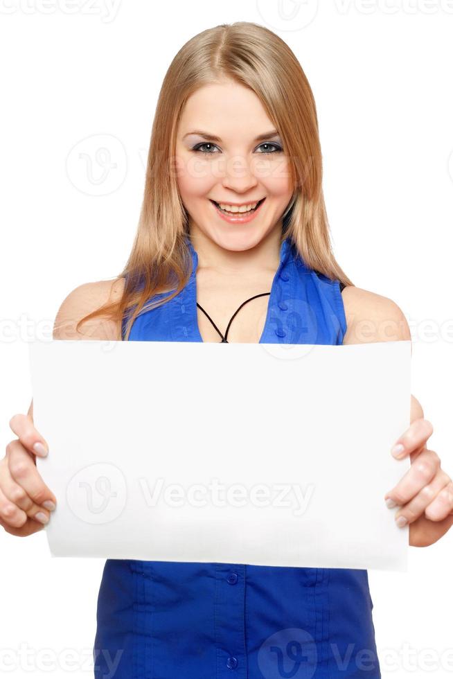 Happy young woman holding empty white board photo