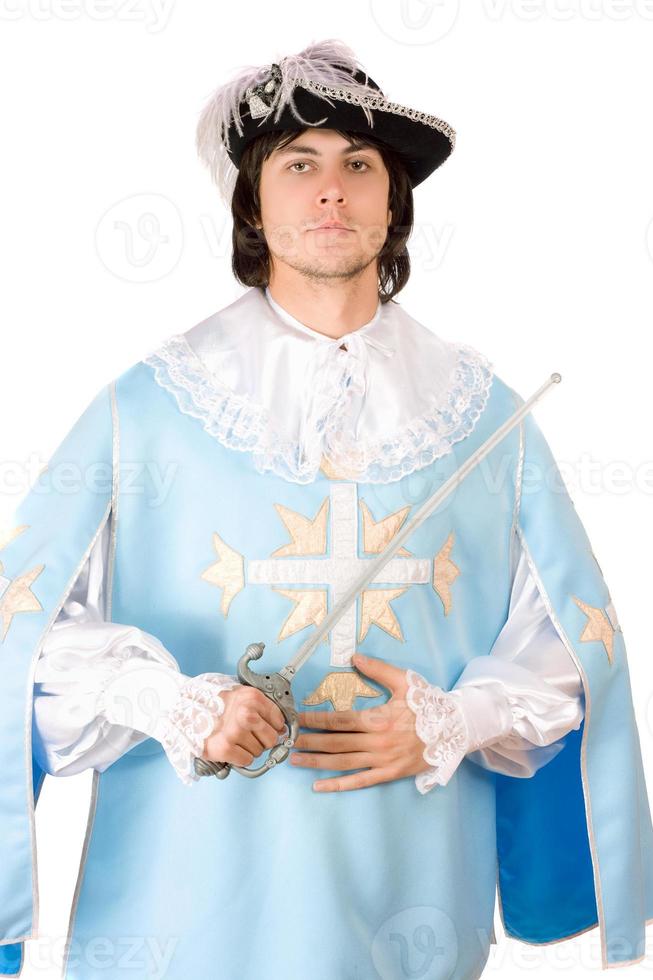 man with a sword dressed as musketeer photo