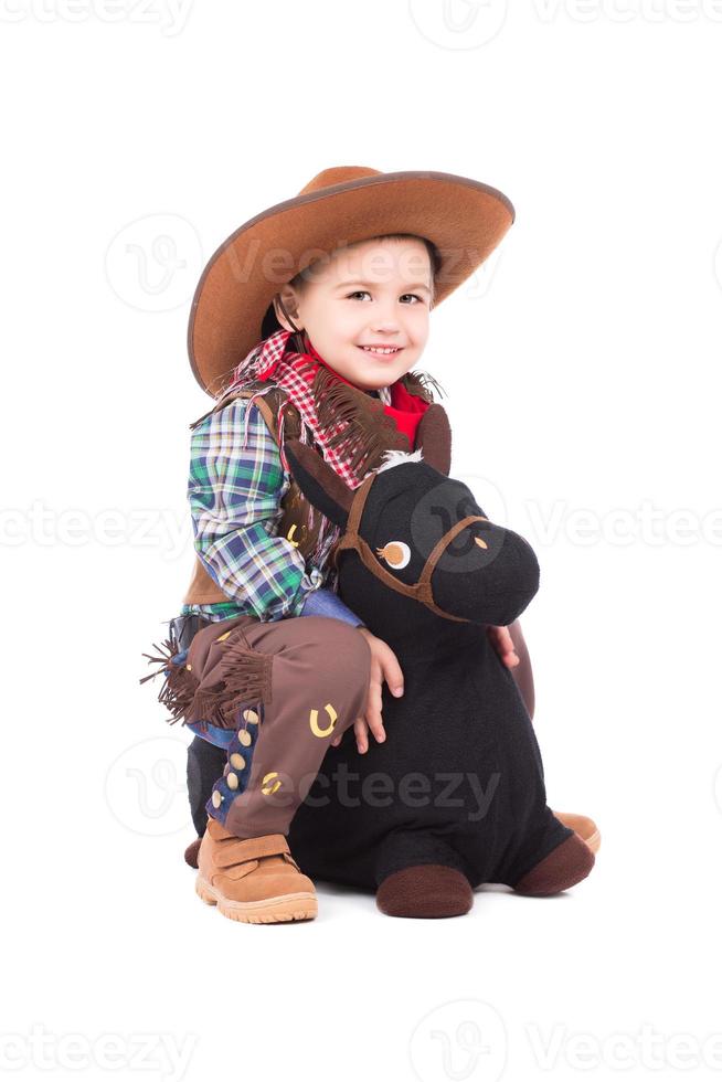 Smiling little cowboy photo
