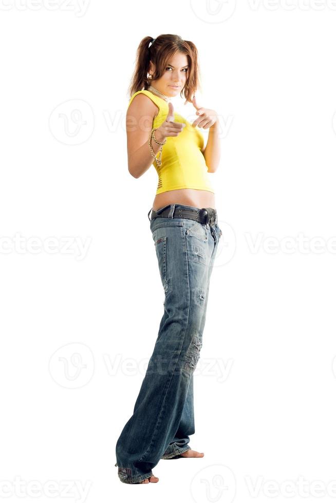 Young woman in wide jeans photo