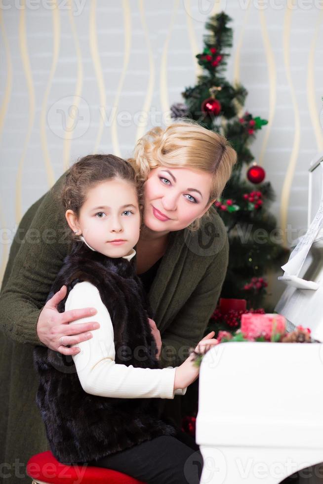 Portrait of woman with a little girl photo