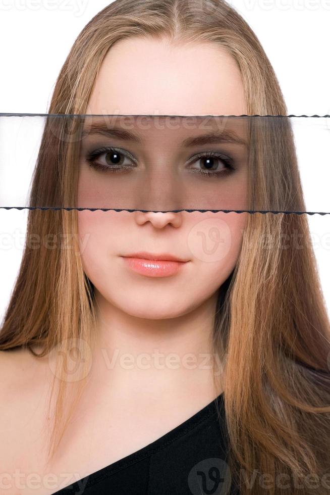 Close-up portrait of beautiful young woman photo