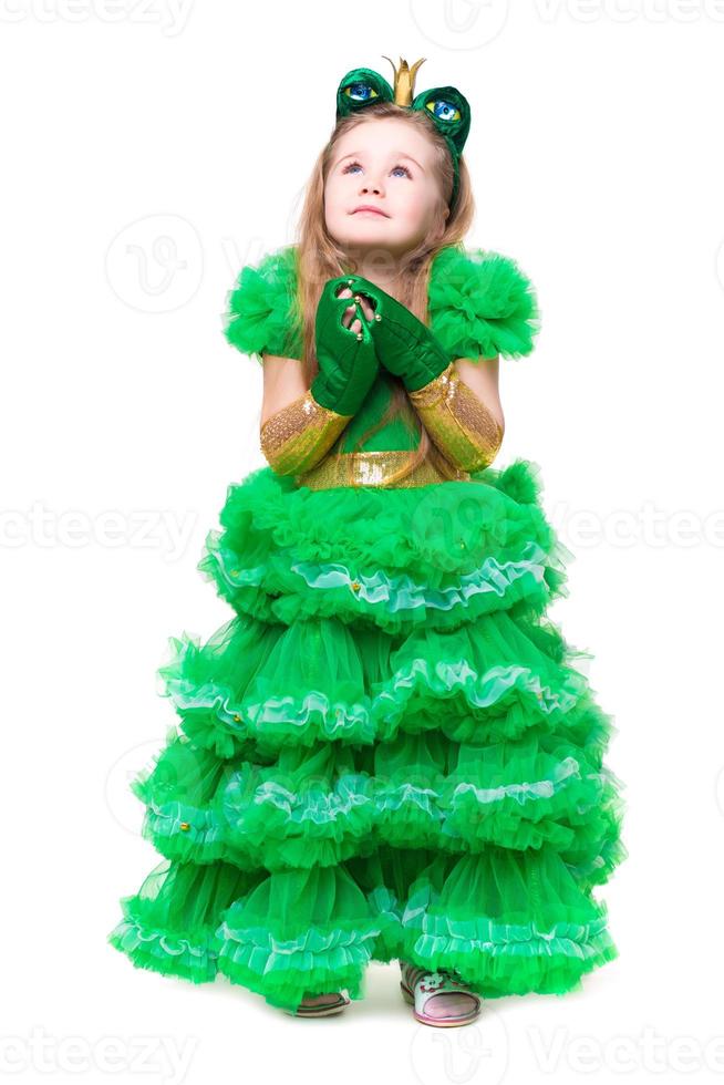 Thoughtful girl posing in frog suit photo