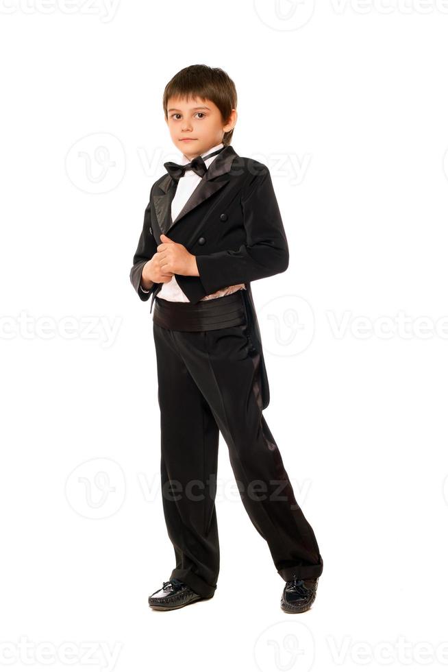 Little boy in a tuxedo. Isolated photo