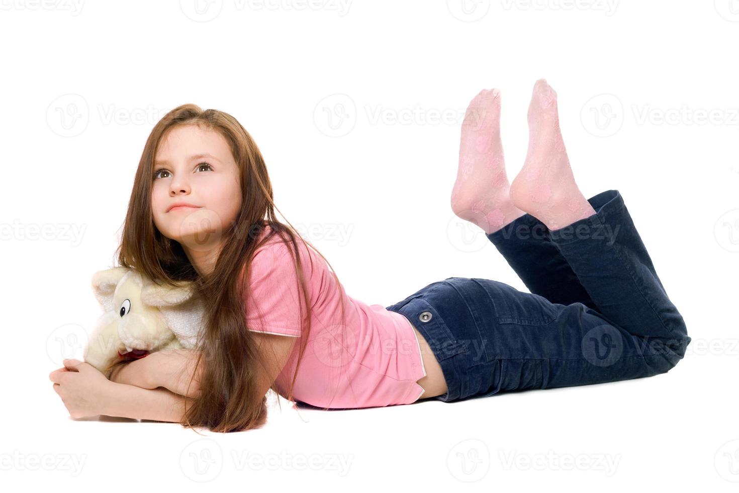 Little girl with a teddy elephant photo