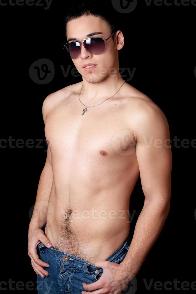 Portrait of guy in sunglasses photo