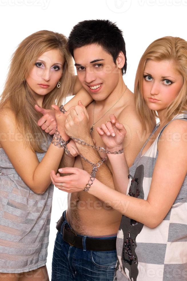 Playful young man and two sad blonde photo