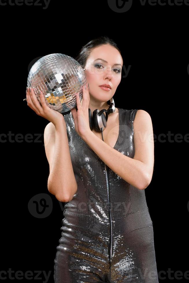 Portrait of nice young brunette with a mirror ball photo