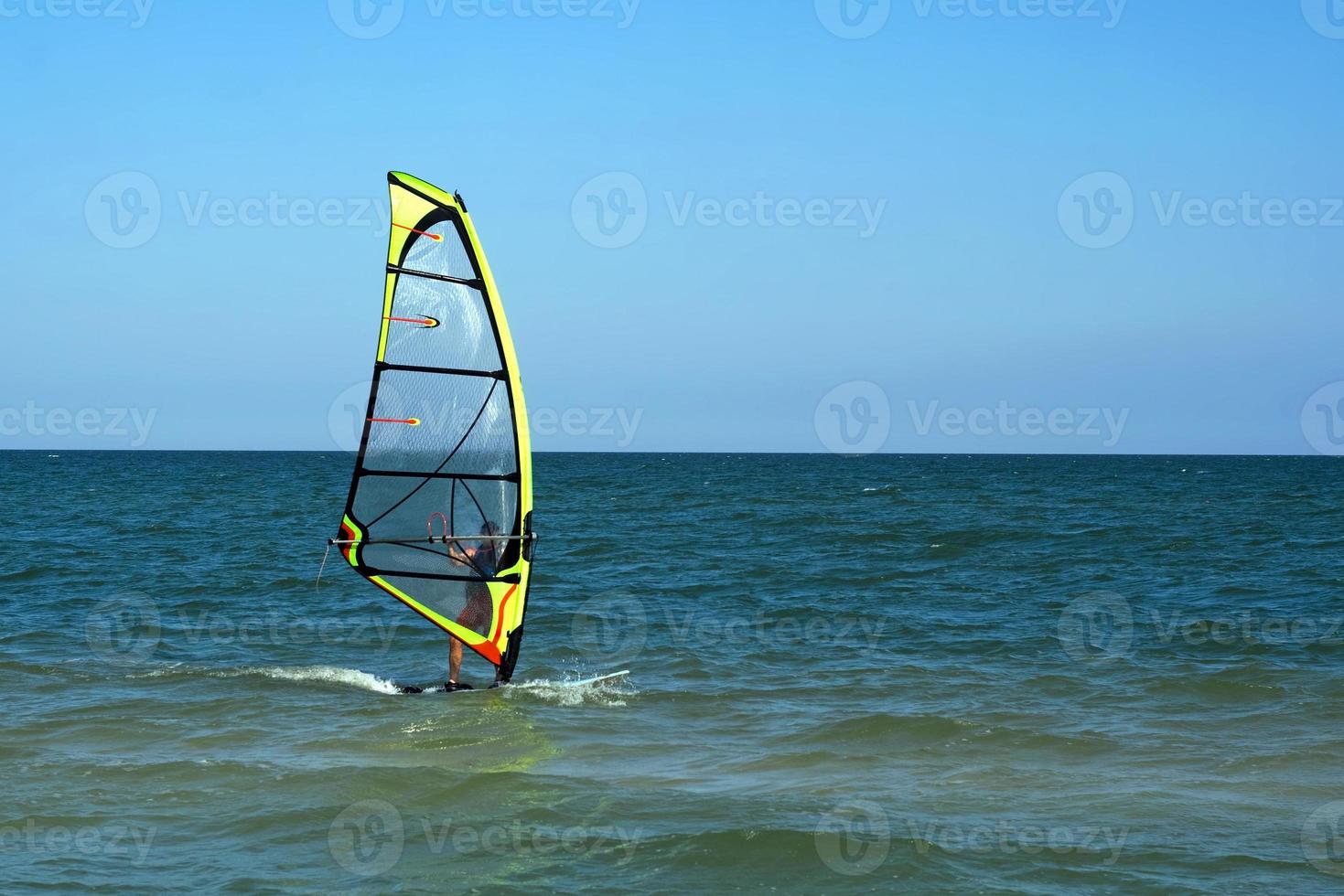 Windsurfer on the ocean photo
