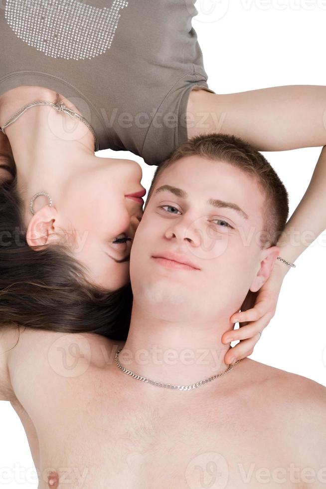 Portrait of the beautiful young couple. Isolated on white background photo