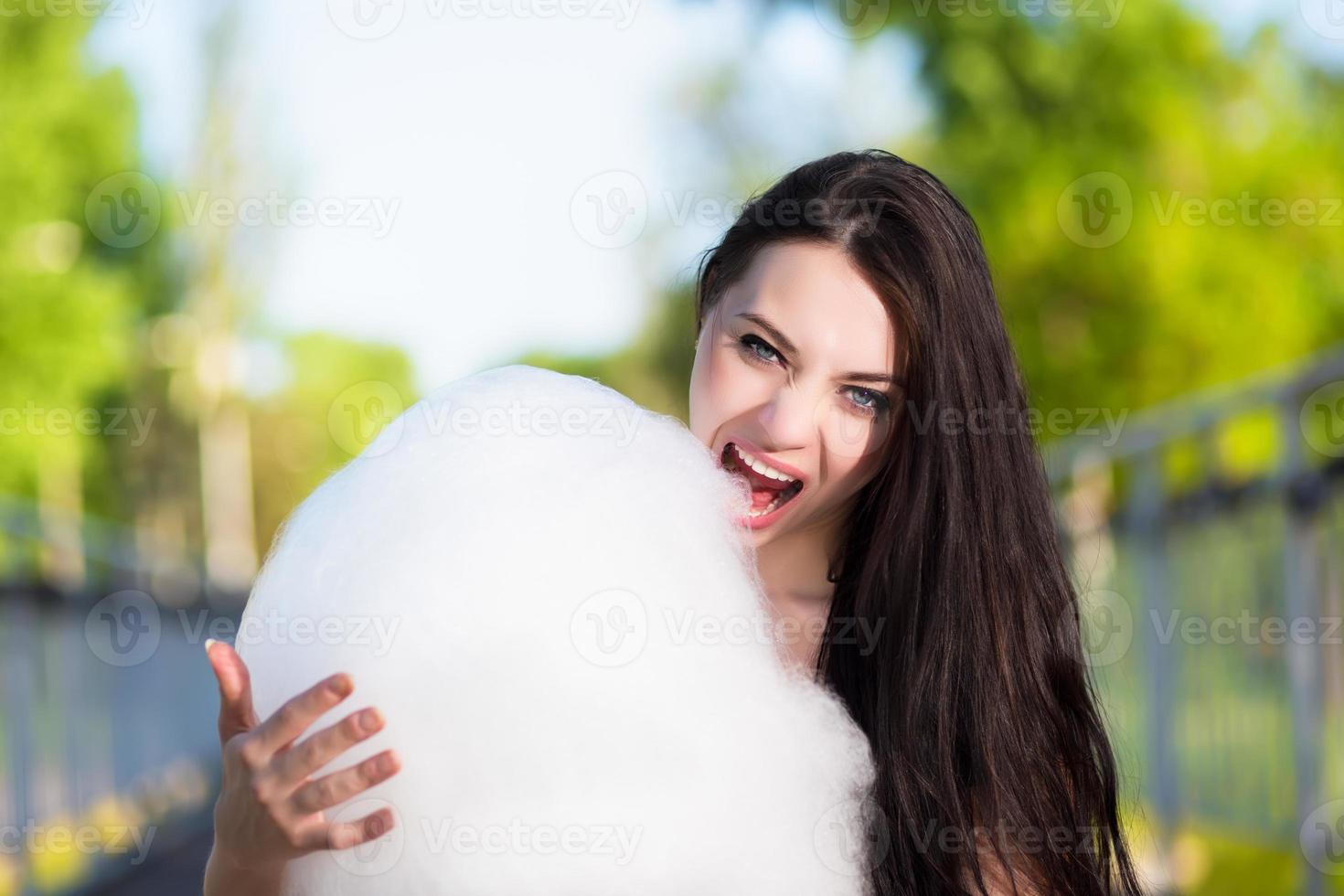 Young brunette eating photo