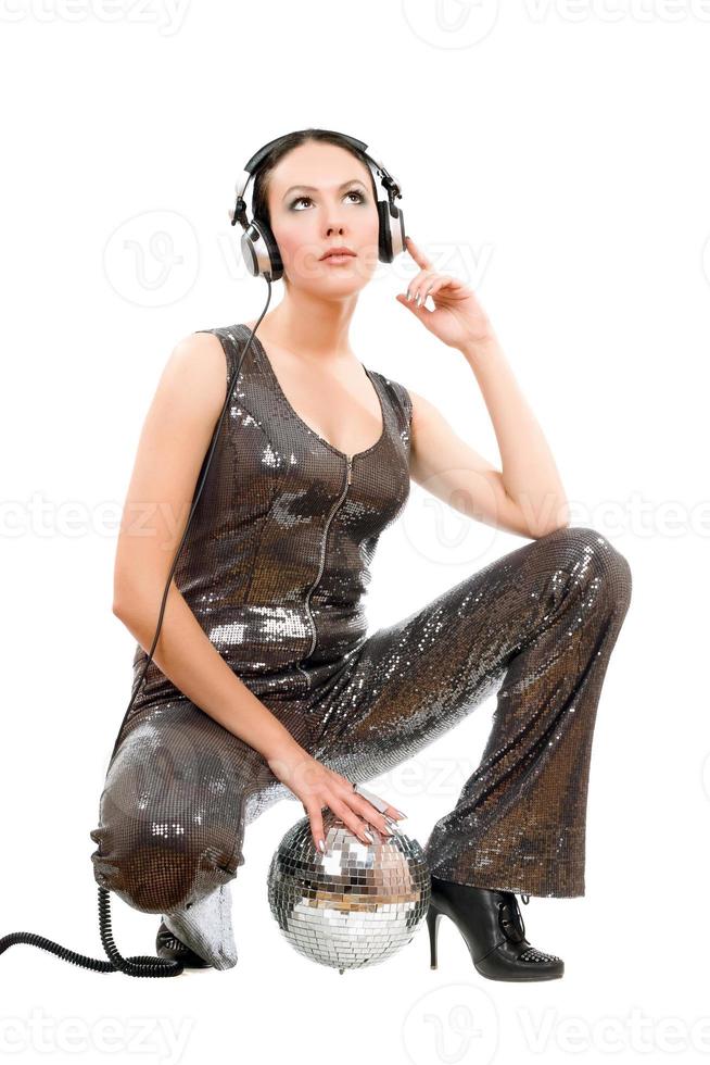 Attractive young brunette in headphones photo