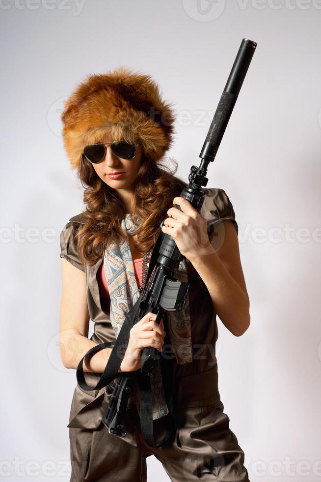 Beautiful armed girl in hat photo