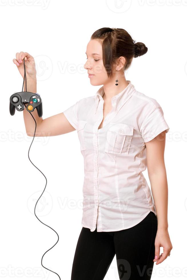 Charming brunette girl with a joystick photo