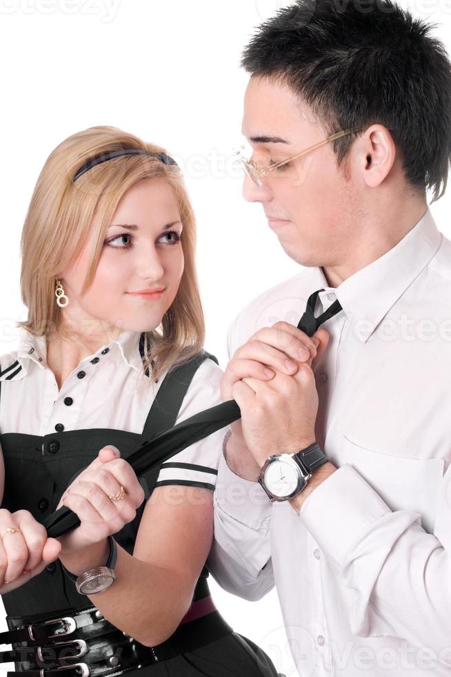 Portrait of funny playful student pair. Isolated photo